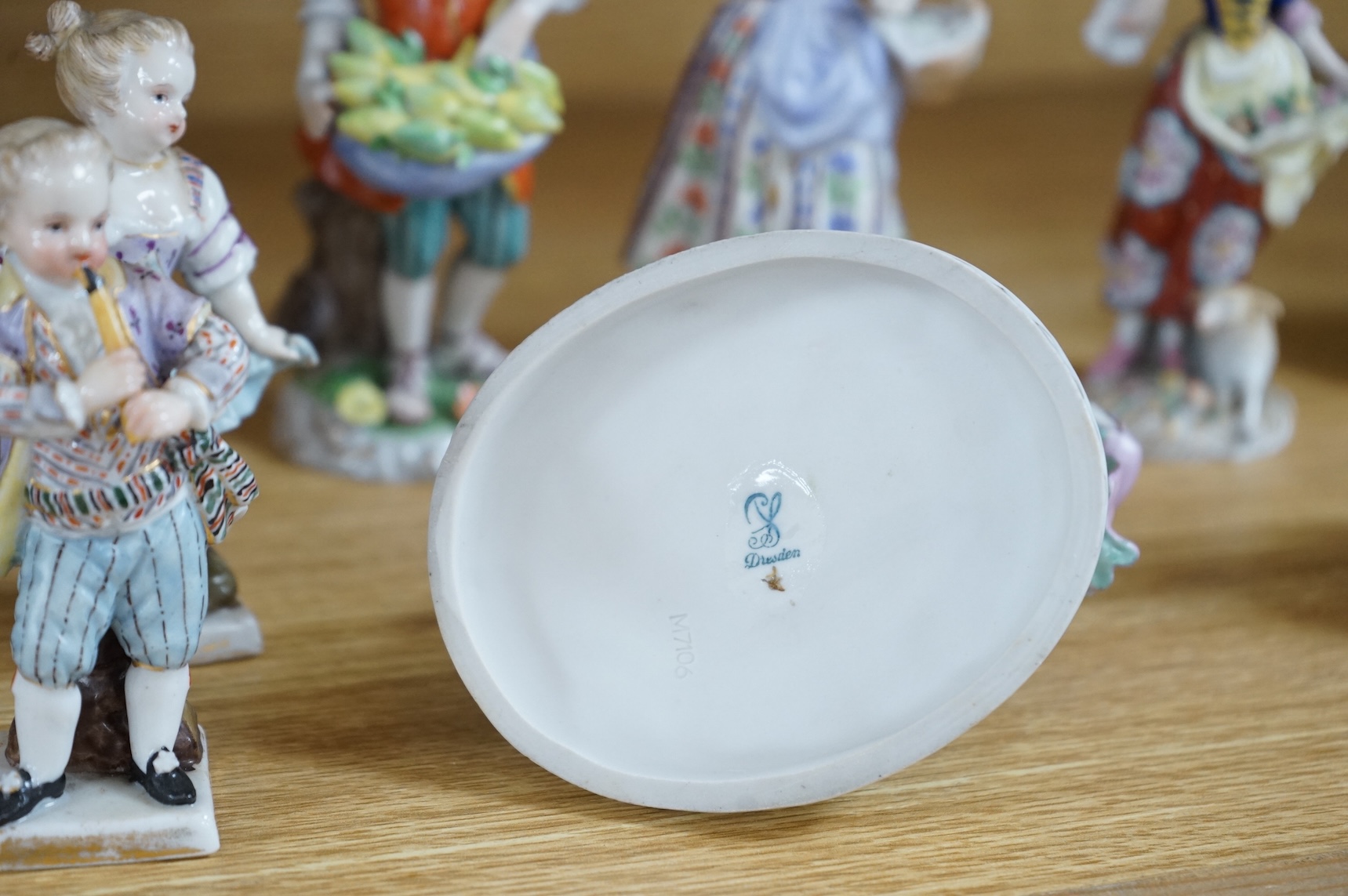A collection of ten German and English porcelain figures and figure groups, mainly late 19th century, to include Dresden, largest 17cm high